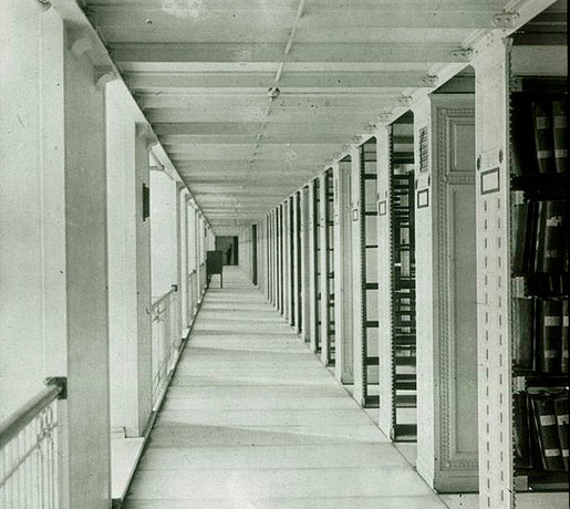An old film photo of library stacks