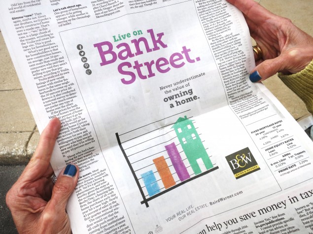 Newspaper print ad for Baird and Warner that reads "Live on Bank Street. Never underestimate the value of owning a home."