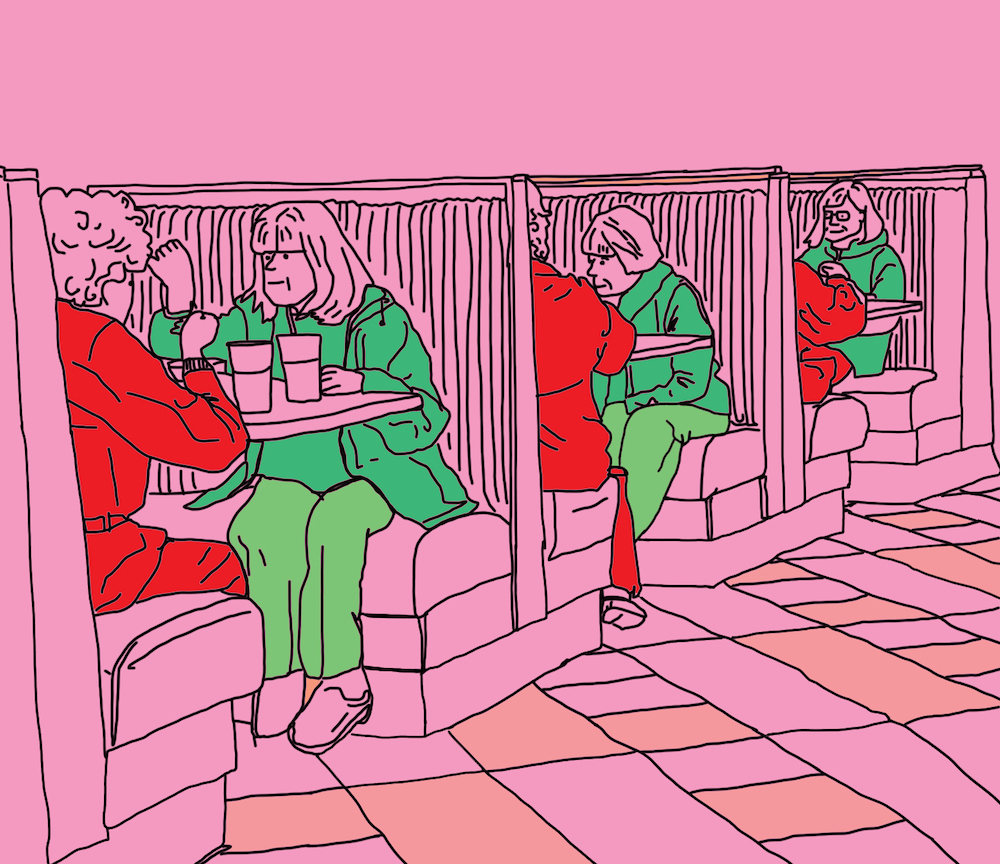 Three rows of booths in a restaurant; each pair of women sitting in the booth wears the same colors.