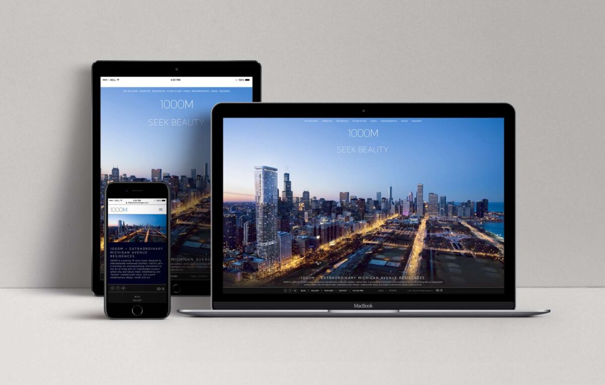 Website design for 1000M displayed on desktop, tablet and mobile