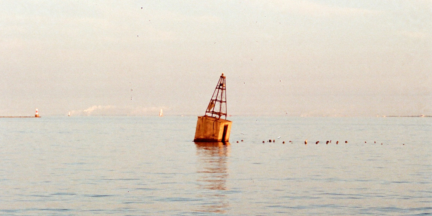 Soft film photo of Lake Michigan with buoy